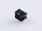 A black plastic plug with multiple square openings and four metal pins on the back, set against a white background.