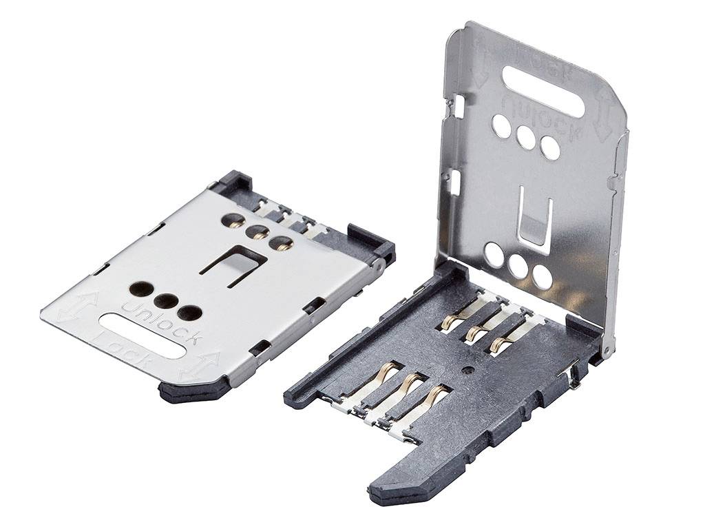 Metal SIM card holder consisting of two parts: a flat base with SIM contacts and a folding lid.