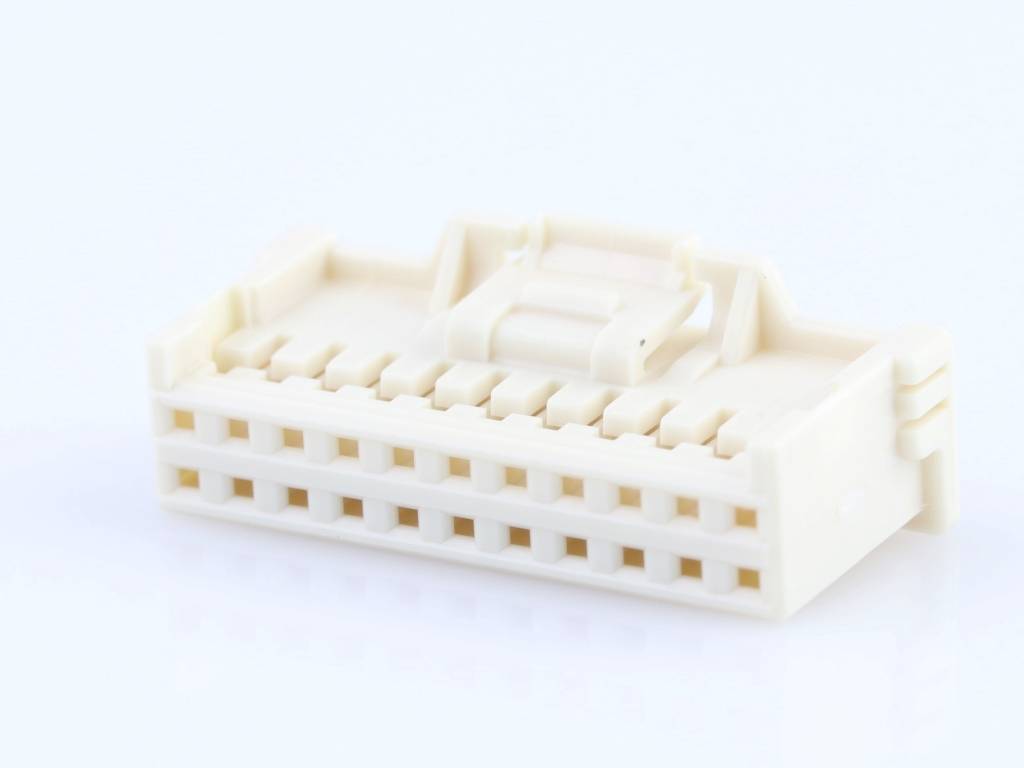 A white plastic plug with multiple connection sockets on a white background, likely for electronic applications.