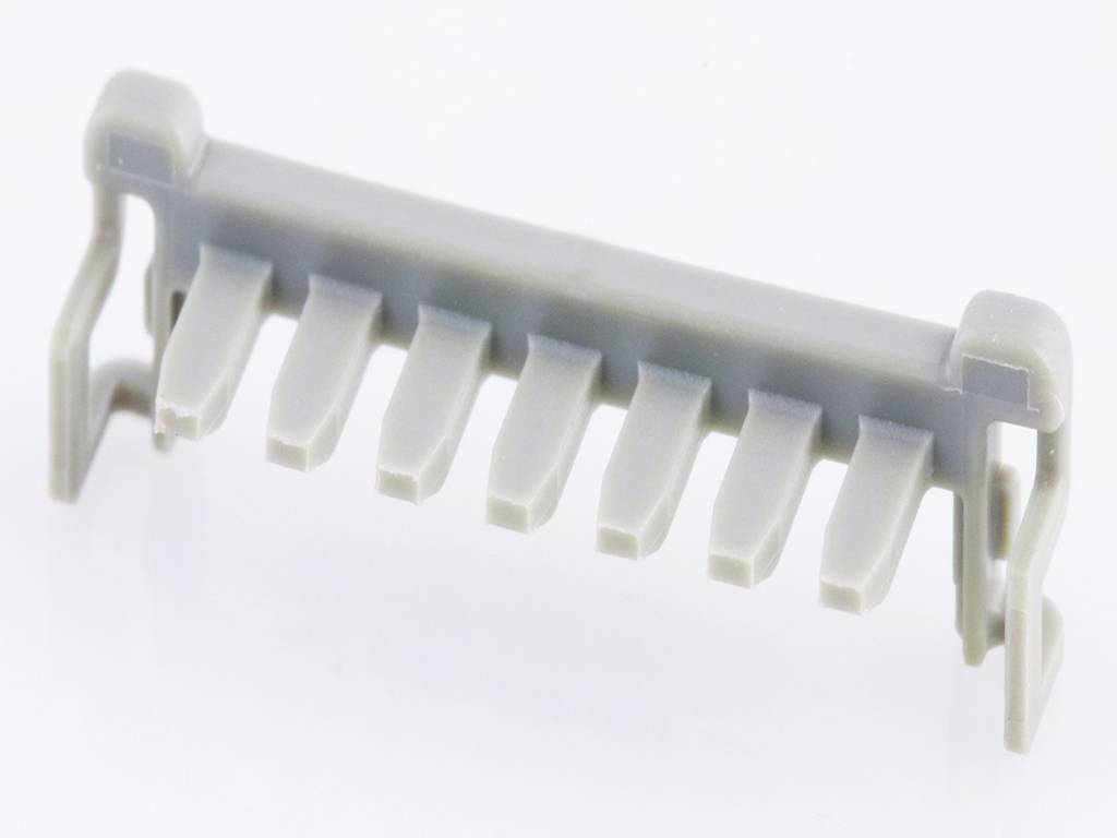 A grey plastic component with seven evenly distributed teeth, likely a mechanical part or connector.