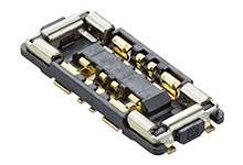 'A small electrical connector with metal contacts and a plastic housing, suitable for electronic devices.'