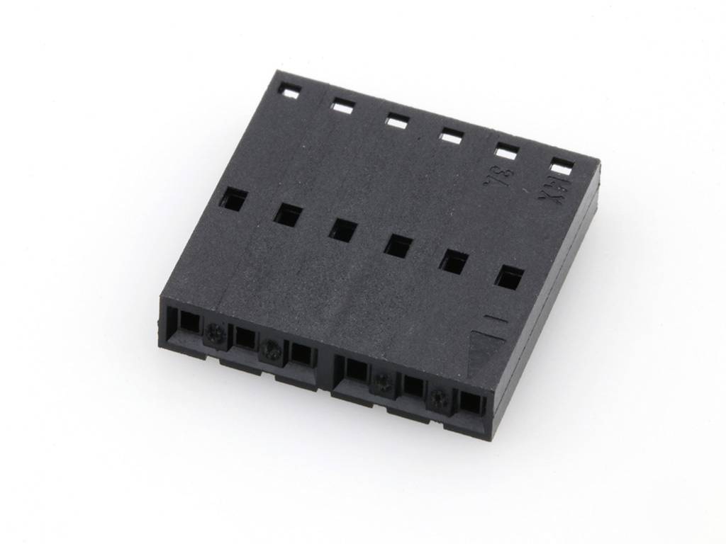 A black, rectangular plastic connector with multiple square openings on the top surface. Designed for electronic connections.