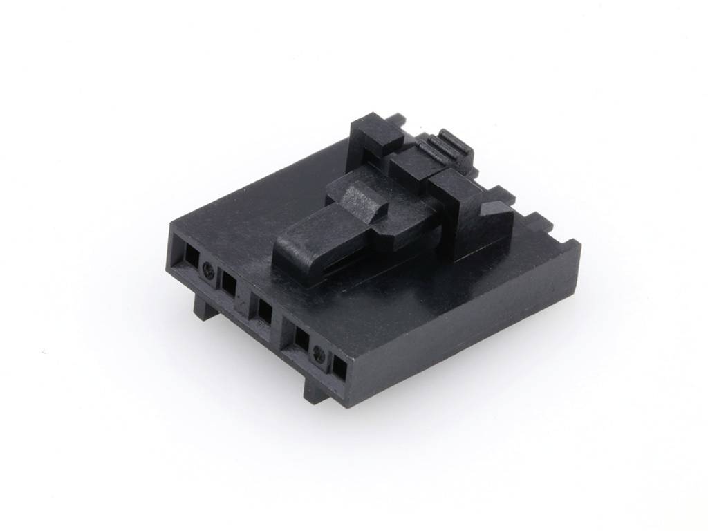 A black plastic plug with multiple connection points and a locking mechanism, used in electronic devices.