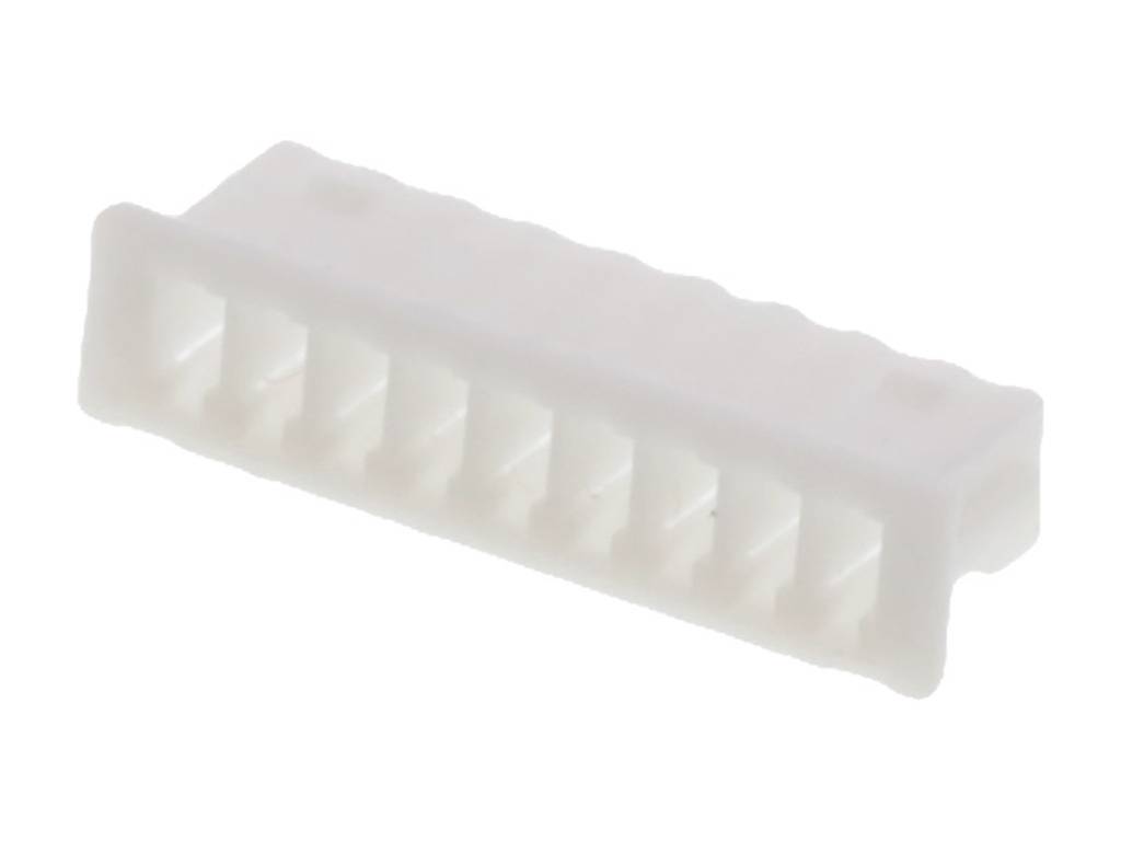 A white, rectangular plastic plug with multiple connection openings, likely for electronic connections.