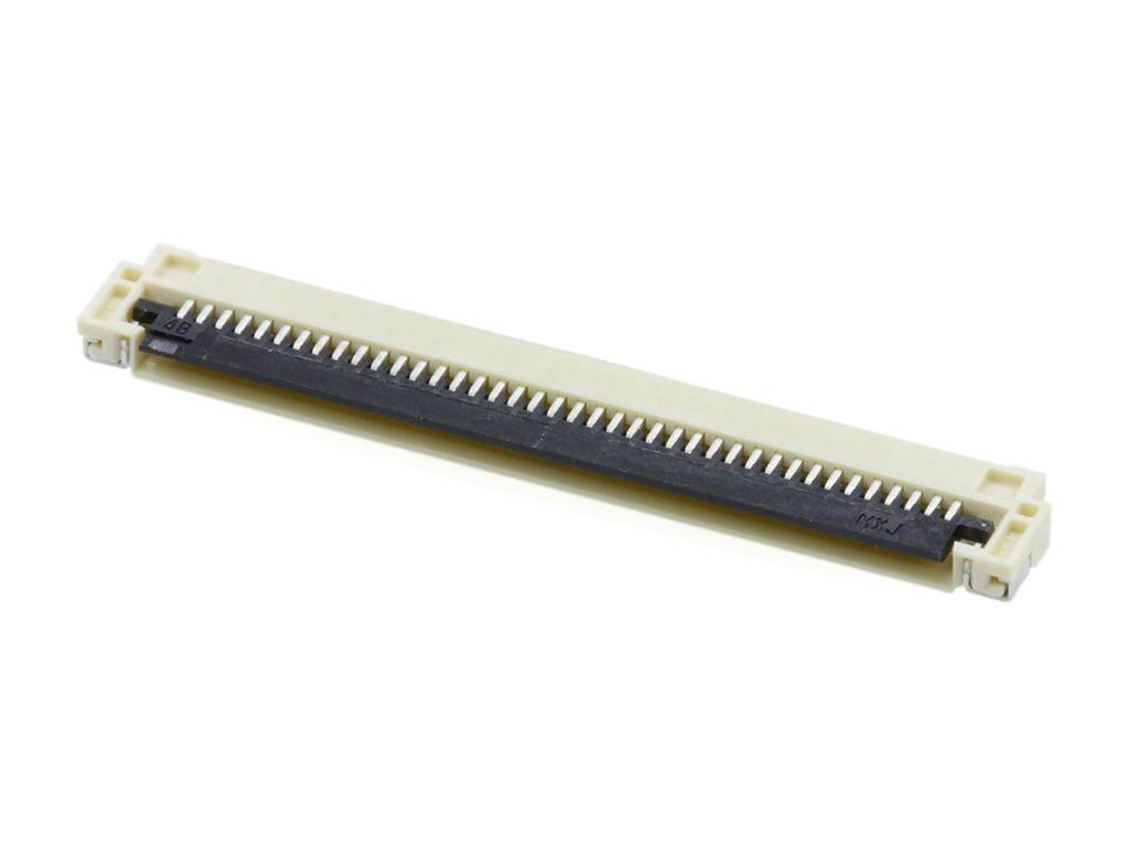 A flat ribbon cable connector, light-coloured housing, numerous pins, for electronic connections on circuit boards.