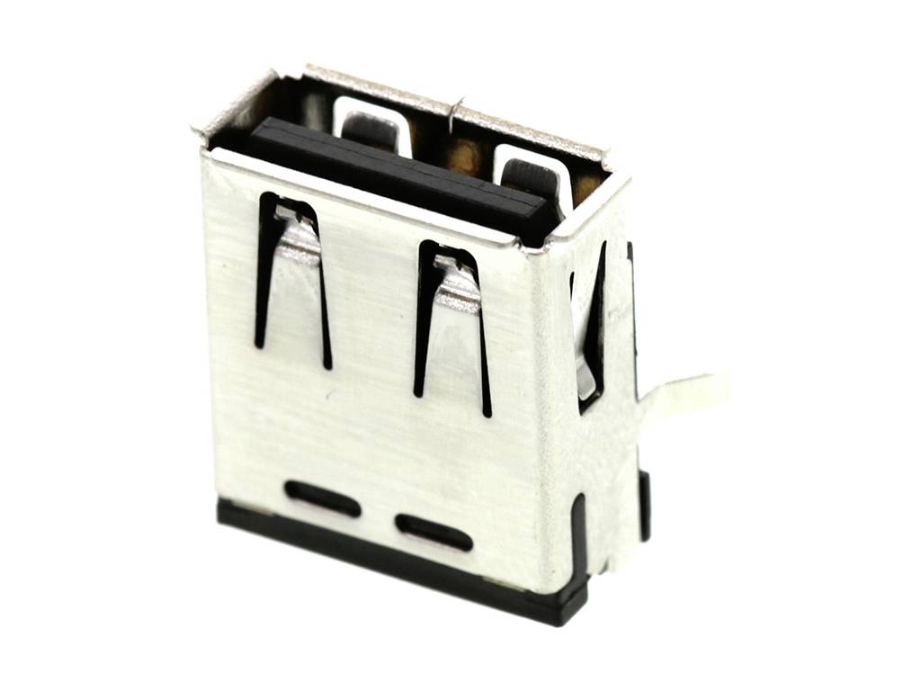 A rectangular USB socket in a metal casing, Type A, which is typical for computer and charger connections.