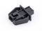 A black plastic component with a rectangular base and asymmetrically positioned prongs. It appears to be a connector or mounting bracket.