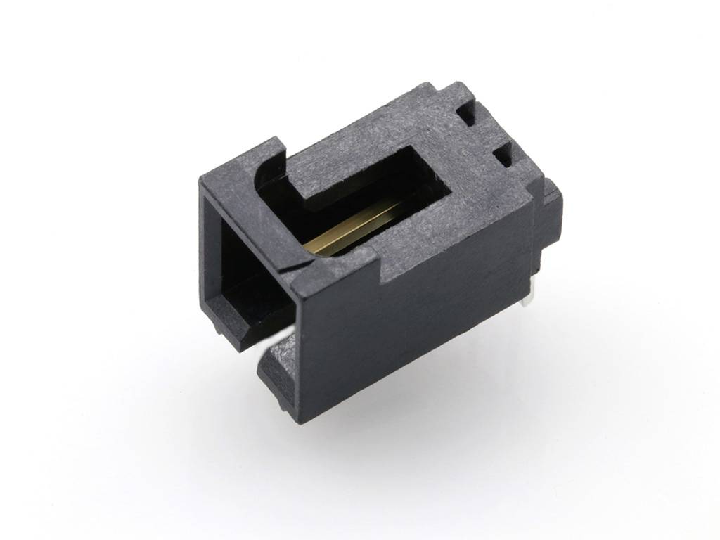 A black two-pole PCB connector with a rectangular opening and two metal contacts, on a white background.