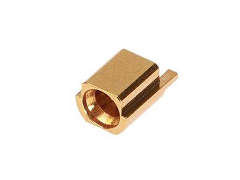 A small, gold-coloured, cylindrical metal sleeve that may serve as a connecting element in electronic devices.