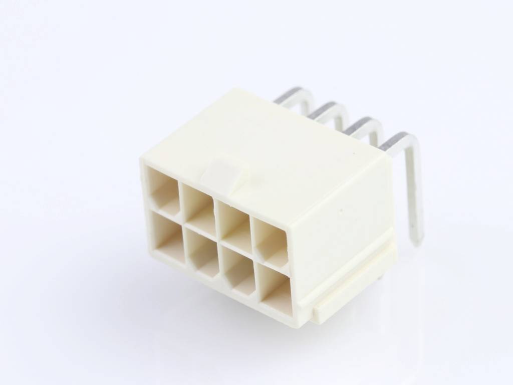 A white electric plug with eight square sockets and metal contacts on a light surface.