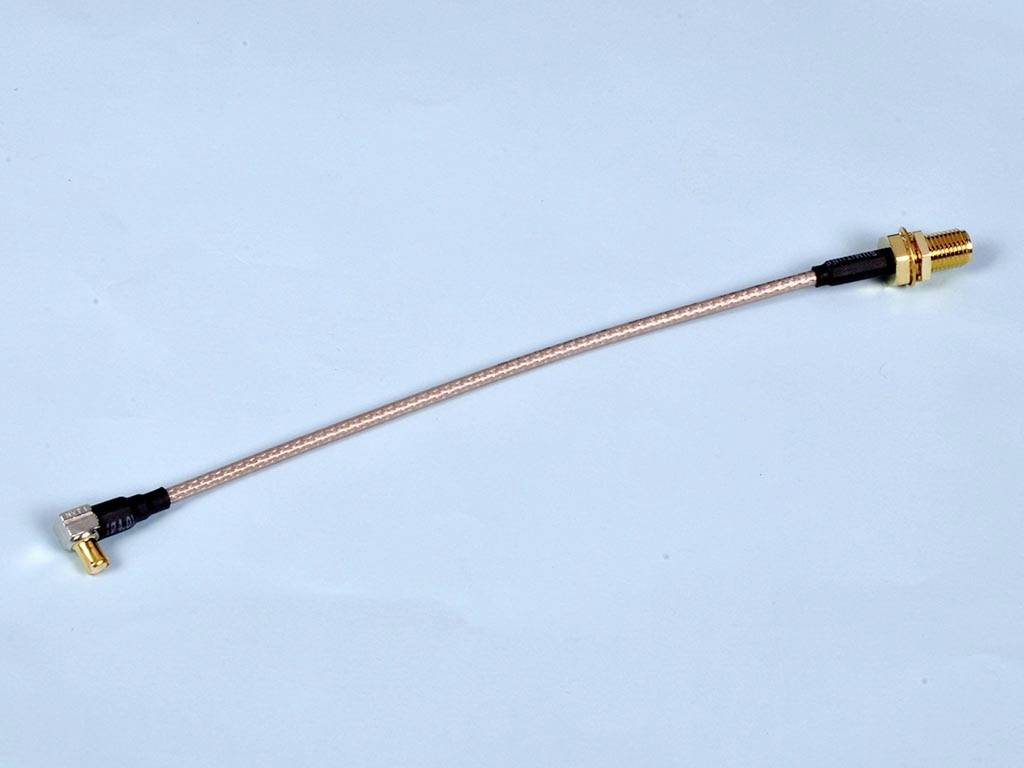 A coaxial connection cable with right-angled connectors at both ends, commonly used for antenna or electronics projects.