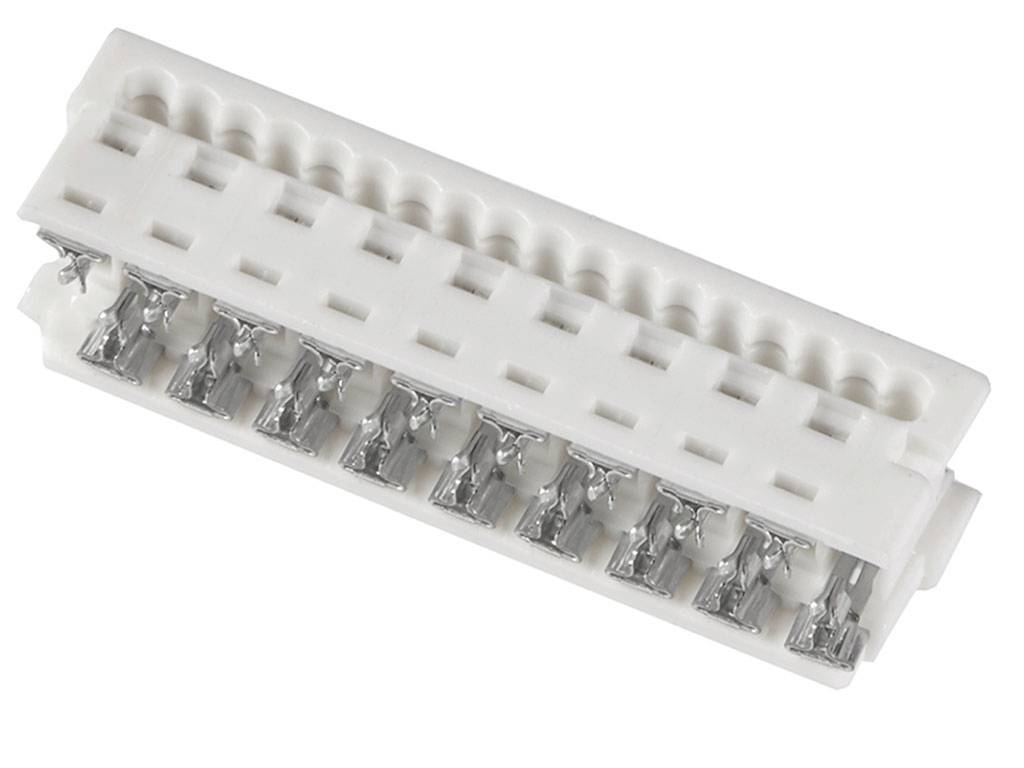 'White plastic terminal block with multiple metal contacts arranged in a row.'