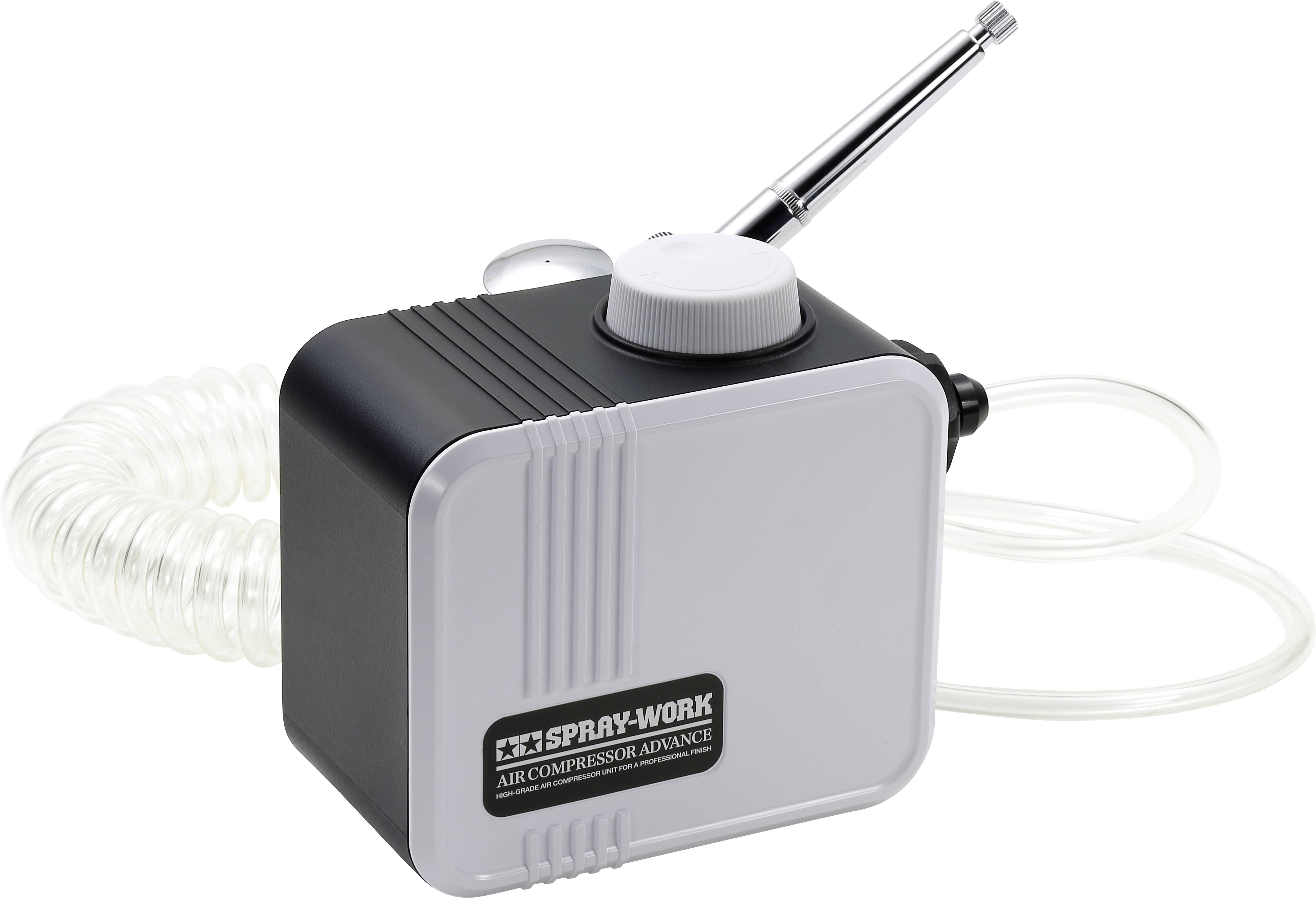 Air compressor for airbrush work with spiral hose and nozzle. Suitable for detailed spraying in model-making and creative projects.