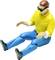 Toy figurine of a seated man wearing a yellow shirt, blue trousers, and sunglasses.
