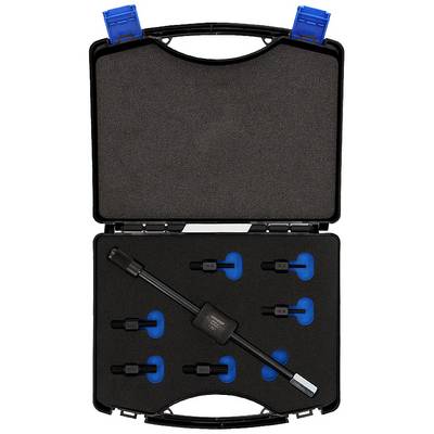 Open black case with foam lining, containing various black plugs and a long cable with a plug.