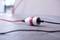 A socket connection lying on the ground: A red cable is connected to a white and red adapter.