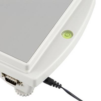 A white device with a metal plate and green button, connected by a cable. Possibly a laboratory or medical instrument.