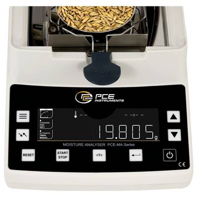 Moisture analyzer showing a grain sample in the top chamber and a digital display reading 19.805 g.