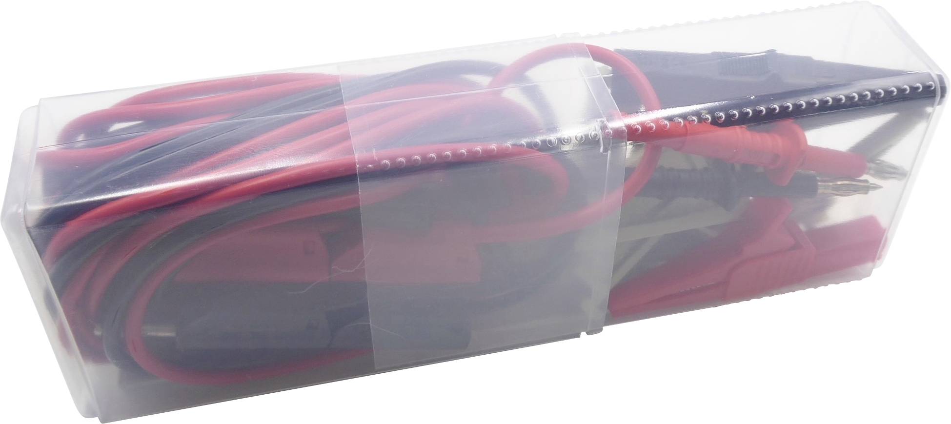 A transparent plastic container is closed, containing red and black cables that terminate in crocodile clips.