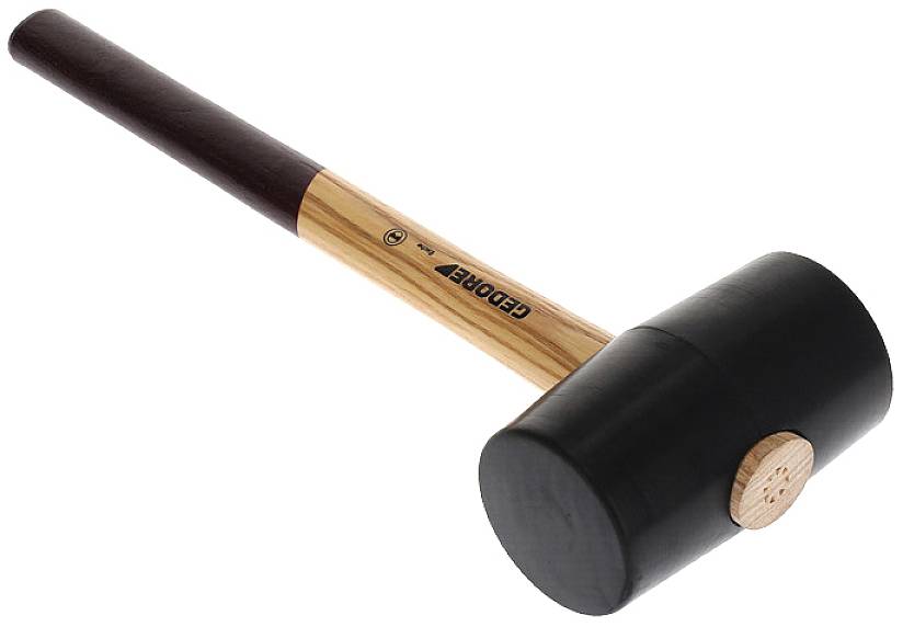 Rubber hammer with wooden handle, black rubber head; used for gentle striking on surfaces during craft work.
