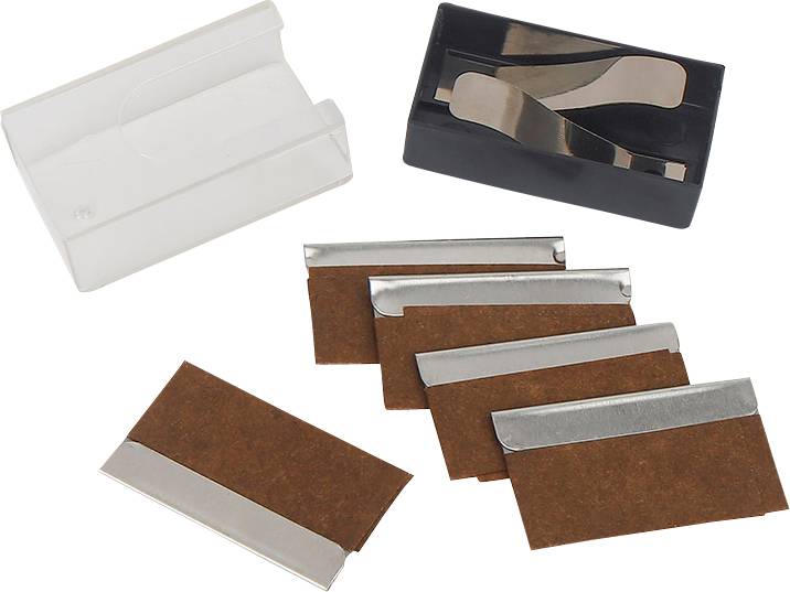 Several razor blades and two holders. The blades are in brown paper sleeves. One holder is white, the other black.