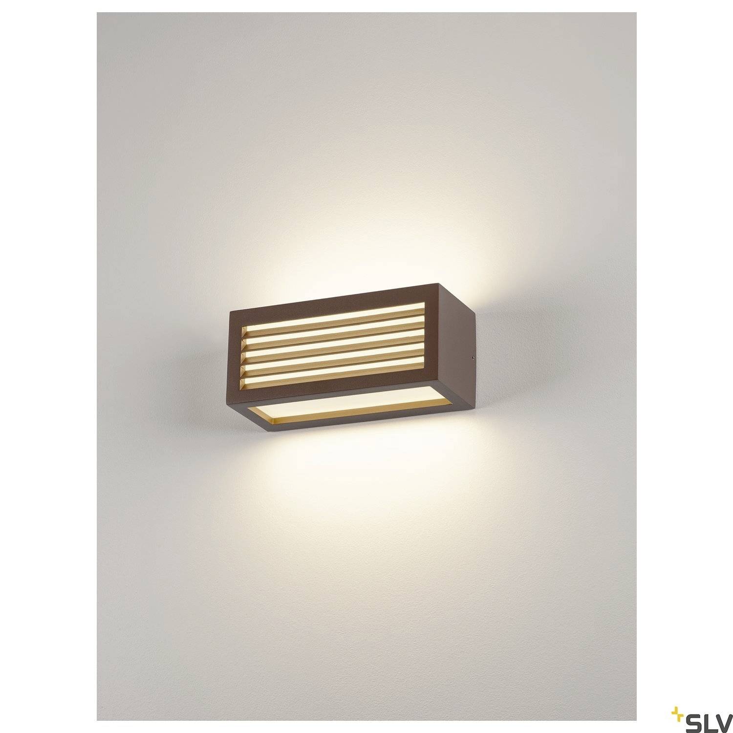 Wall light with a rectangular design, emitting light upwards and downwards for indirect illumination. Brown, with a modern appearance.