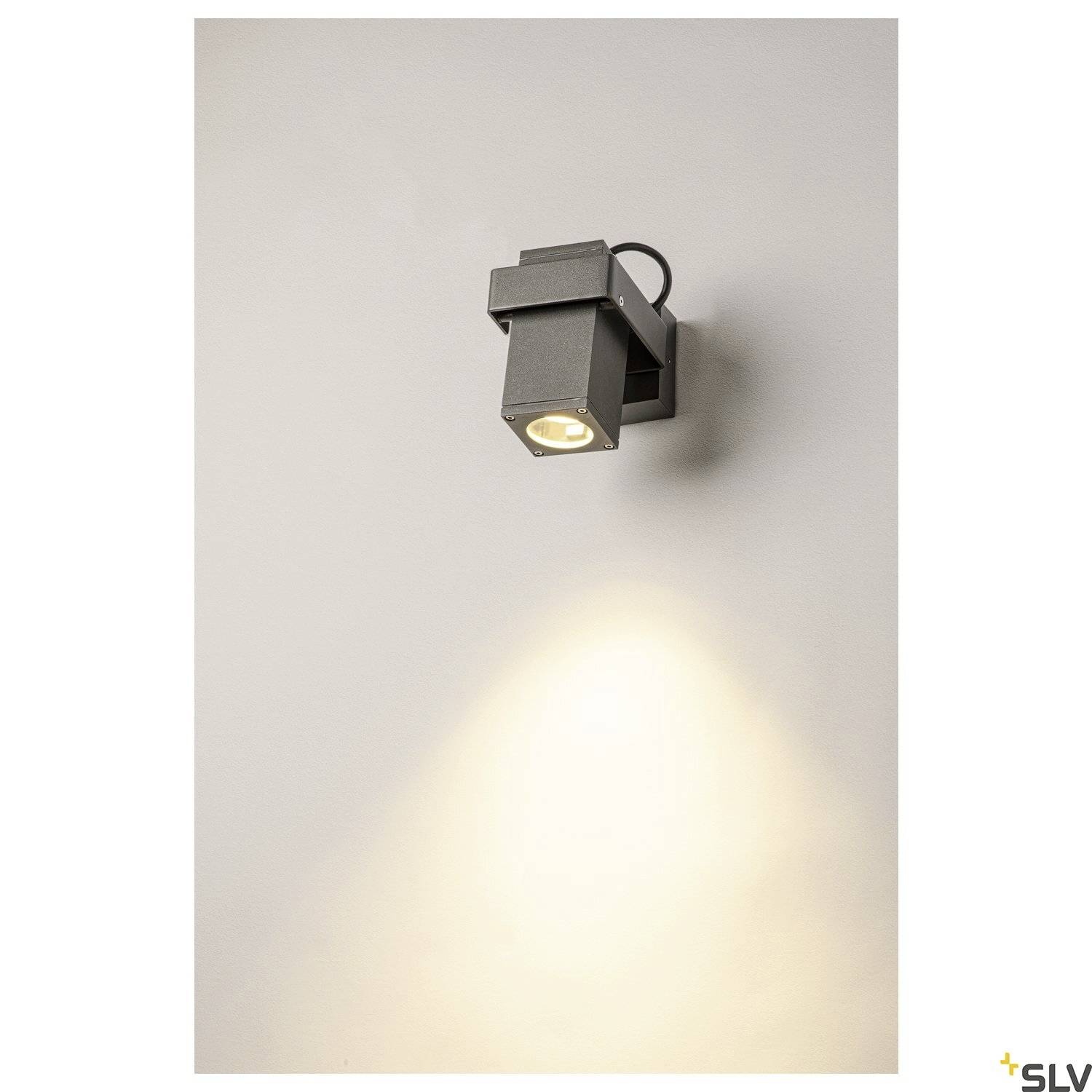 Wall light with a modern design that radiates a warm beam of light onto the wall. Perfect for creating atmospheric room lighting.