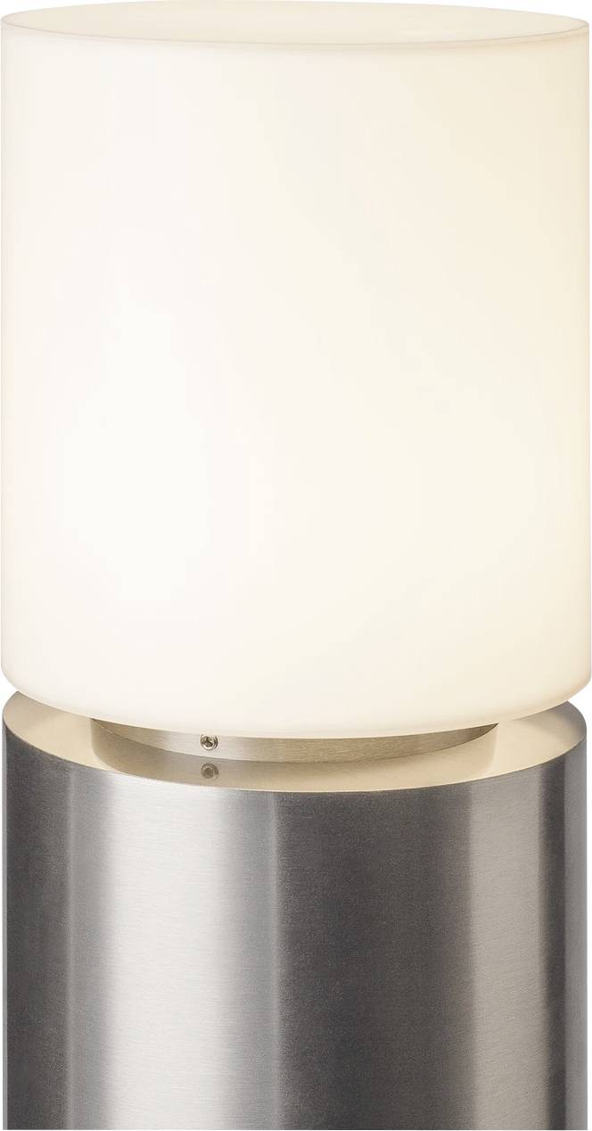 Modern table lamp with a cylindrical, frosted glass design and silver metal base, switched on and emitting a warm, radiant light.