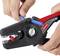 Two hands are operating a wire stripping pliers holding a blue cable. The pliers have a red KNIPEX logo and are partially red and black.