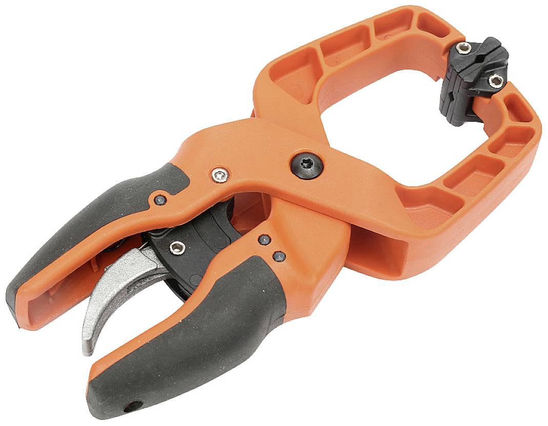 Orange spring clamp with a black handle and metal jaws, suitable for use in workshops or DIY projects.