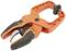 An orange-coloured clamp with black handles and a tension spring, used for attaching or securing objects.
