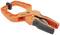 An orange and black clip with the 'PONY' imprint, used for holding materials together.