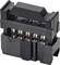 Black electrical connector, rectangular with multiple metal pins and protective cover; for wiring and electronic devices.