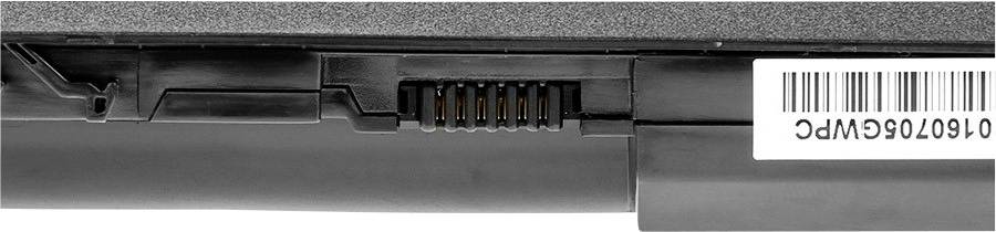 A laptop battery is seen up close. The focus is on the electrical contacts and a barcode on the right side.