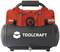 A compact, portable air compressor by Toolcraft with a red upper housing and black tank, suitable for DIY projects.