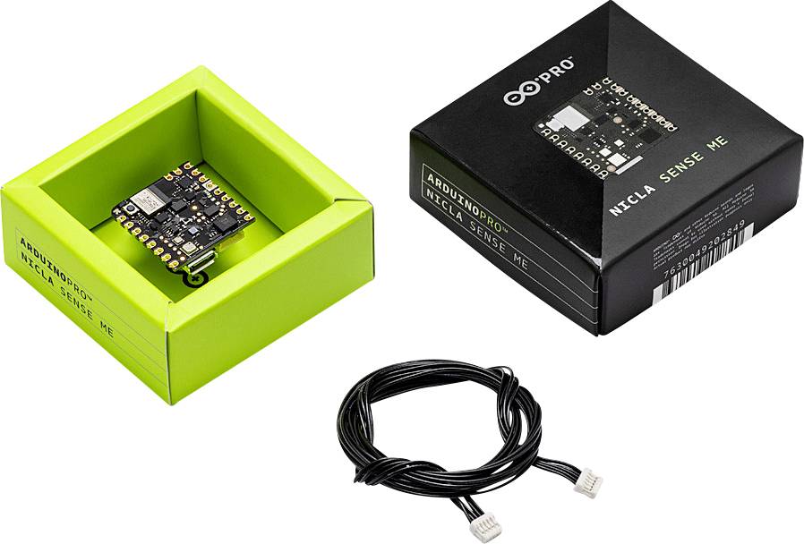 'Two Arduino microcontrollers in open boxes, one in green, one in black, with a black connecting cable beside them.'