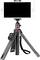 Smartphone mounted on a compact, black and red tripod, ready for photography or video recording.