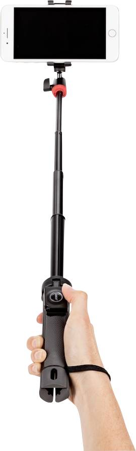 A hand is holding a selfie stick with a smartphone attached. The stick is extended.