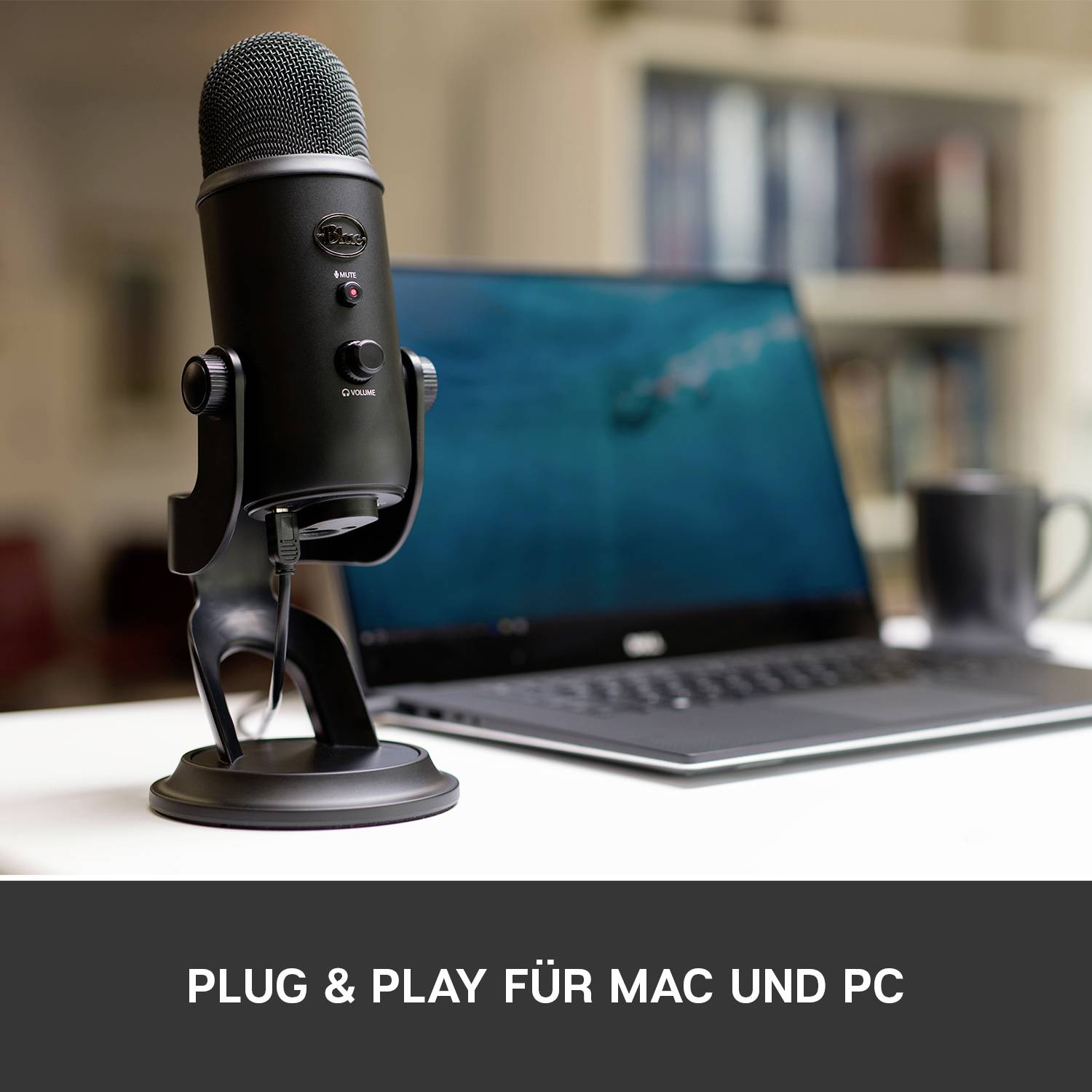 A microphone stands in front of a laptop on a table. The text in the image reads 'PLUG & PLAY FOR MAC AND PC'.
