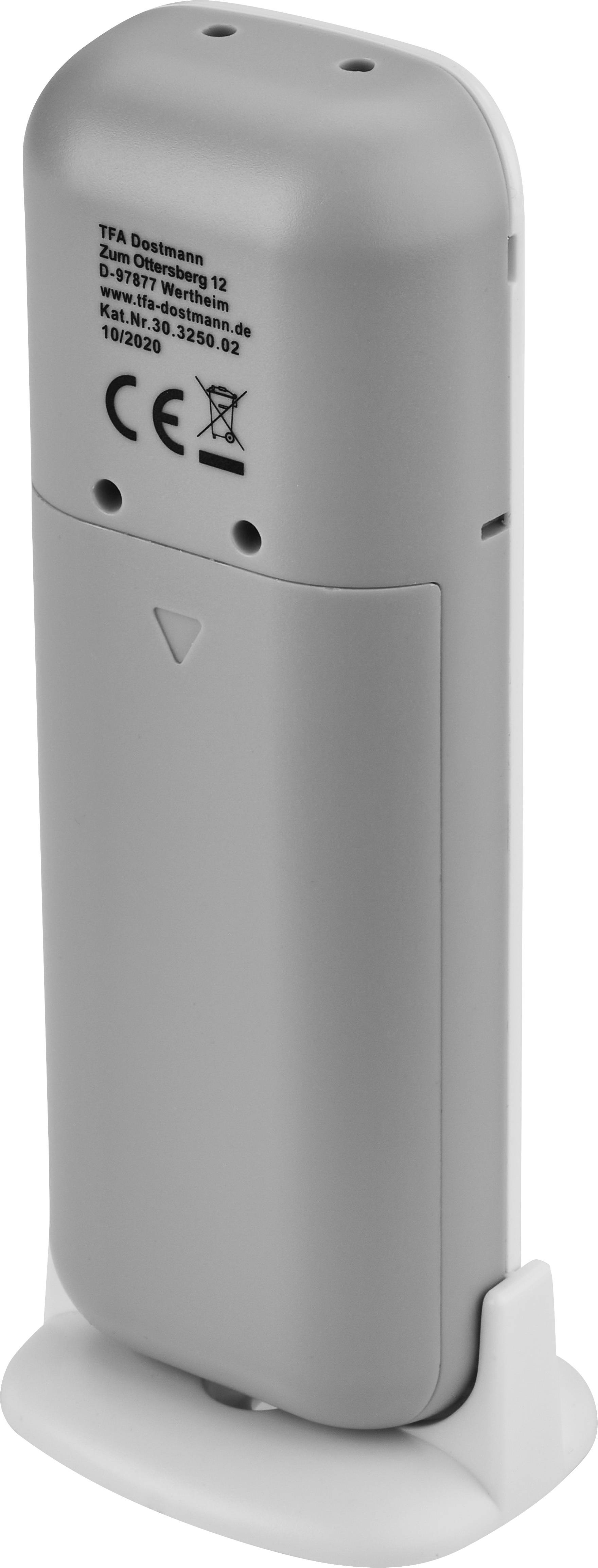 Rear view of a grey electronic device with CE marking, standing upright in a holder.