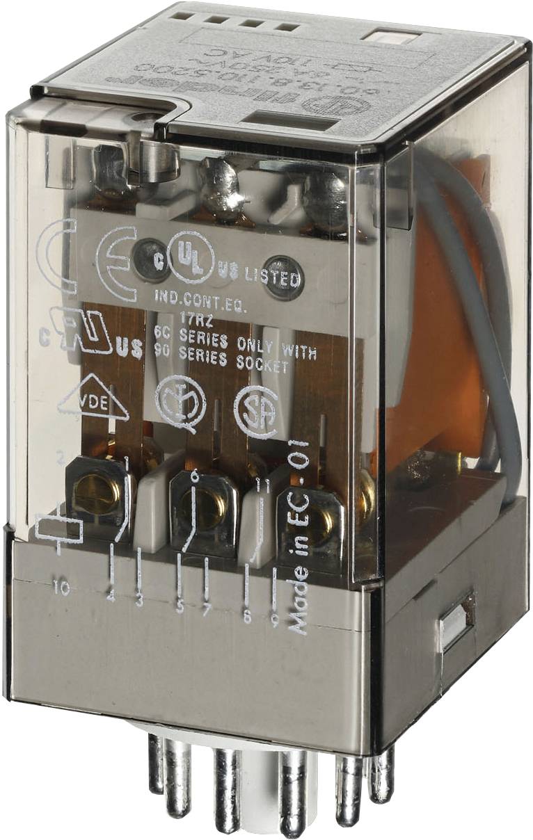 A transparent relay housing with visible contacts and coils. Printed markings show technical information and certificates.