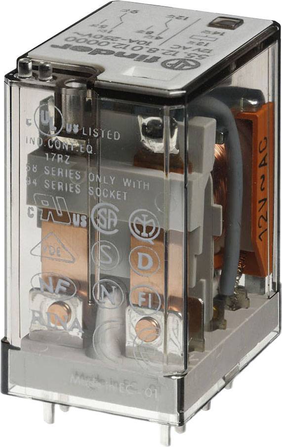 A relay in a transparent enclosure with copper coils and wire connections, showing electrical engineering components for switching controls.