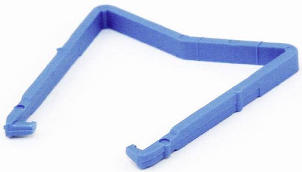 A z-shaped, blue plastic clip is resting on a white surface.