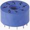 Blue electrical connector with circular arrangement of metal contacts, suitable for tubes or similar applications.