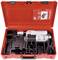Red tool case, opened, contains pipe cutter with accessories. A red instruction manual is located in the lid.