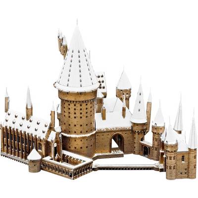 A miniature castle with numerous towers and snow-covered roofs, designed in a fairytale-like architectural style.