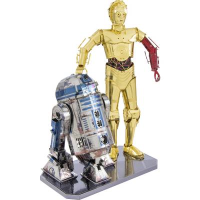 A silver and blue droid stands next to a golden robot on a display. The golden robot raises a red arm.
