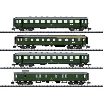 Four green railway carriages in a row on a track. Variations in window and door configurations. Nostalgic design from the classic railway era.