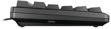 Black computer keyboard shown from the side with raised key profiles, demonstrating the compact design and tilting angles of the keys.