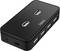 Black USB hub with six ports, brand 'hama'. Ideal for expanding the USB connection options of a computer.